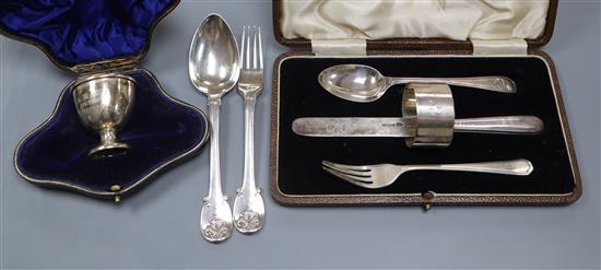 A George III silver spoon and fork christening set, by William Ely, London 1817, a cased knife, fork, spoon and